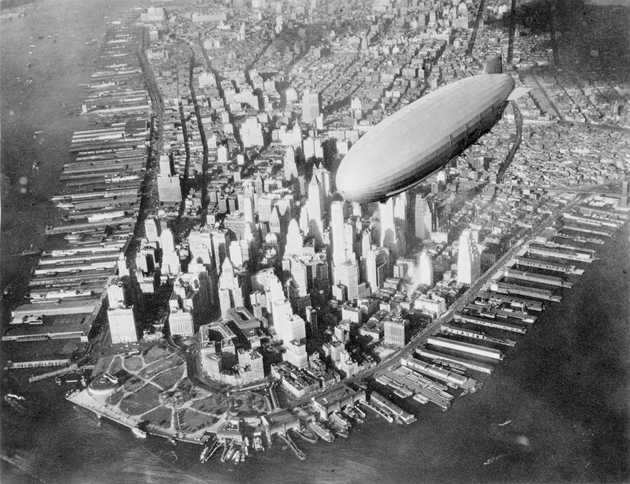 The USS Akron flying over New York City. The zeppelin would later crash off the coast of New England, killing 76 crew members